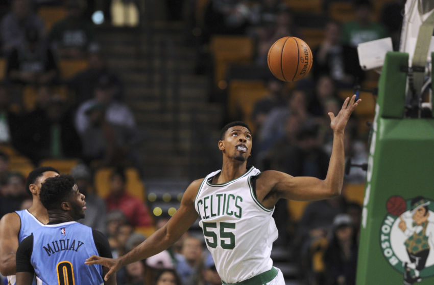 Nov 6, 2016; Boston, MA, USA; Boston Celtics forward Jordan Mickey (55) battles for a loose ball during the second half against the Denver Nuggets at TD Garden. Mandatory Credit: Bob DeChiara-USA TODAY Sports
