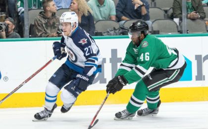 Oct 25, 2016; Dallas, TX, USA; Winnipeg Jets right wing Nikolaj Ehlers (27) and Dallas Stars center Gemel Smith (46) in action during the game at the American Airlines Center. The Stars defeat the Jets 3-2. Mandatory Credit: Jerome Miron-USA TODAY Sports