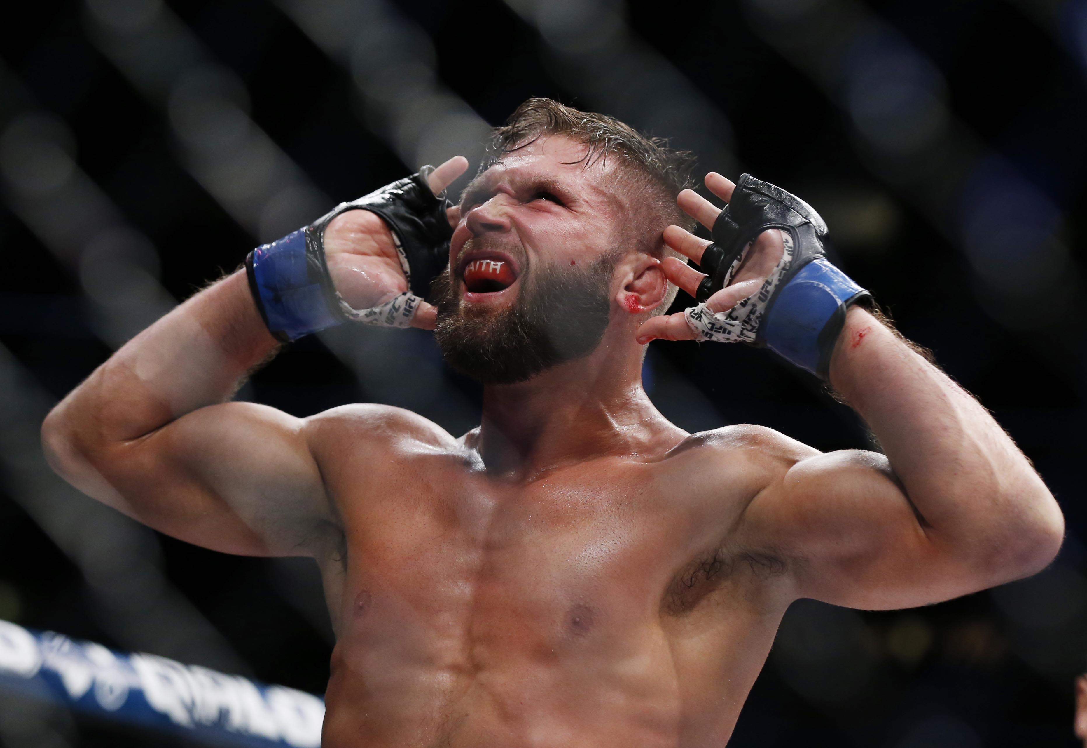 Nov 12, 2016; New York, NY, USA; Jeremy Stephens (blue gloves) reacts during his fight against Frankie Edgar (red gloves) during UFC 205 at Madison Square Garden. Mandatory Credit: Adam Hunger-USA TODAY Sports