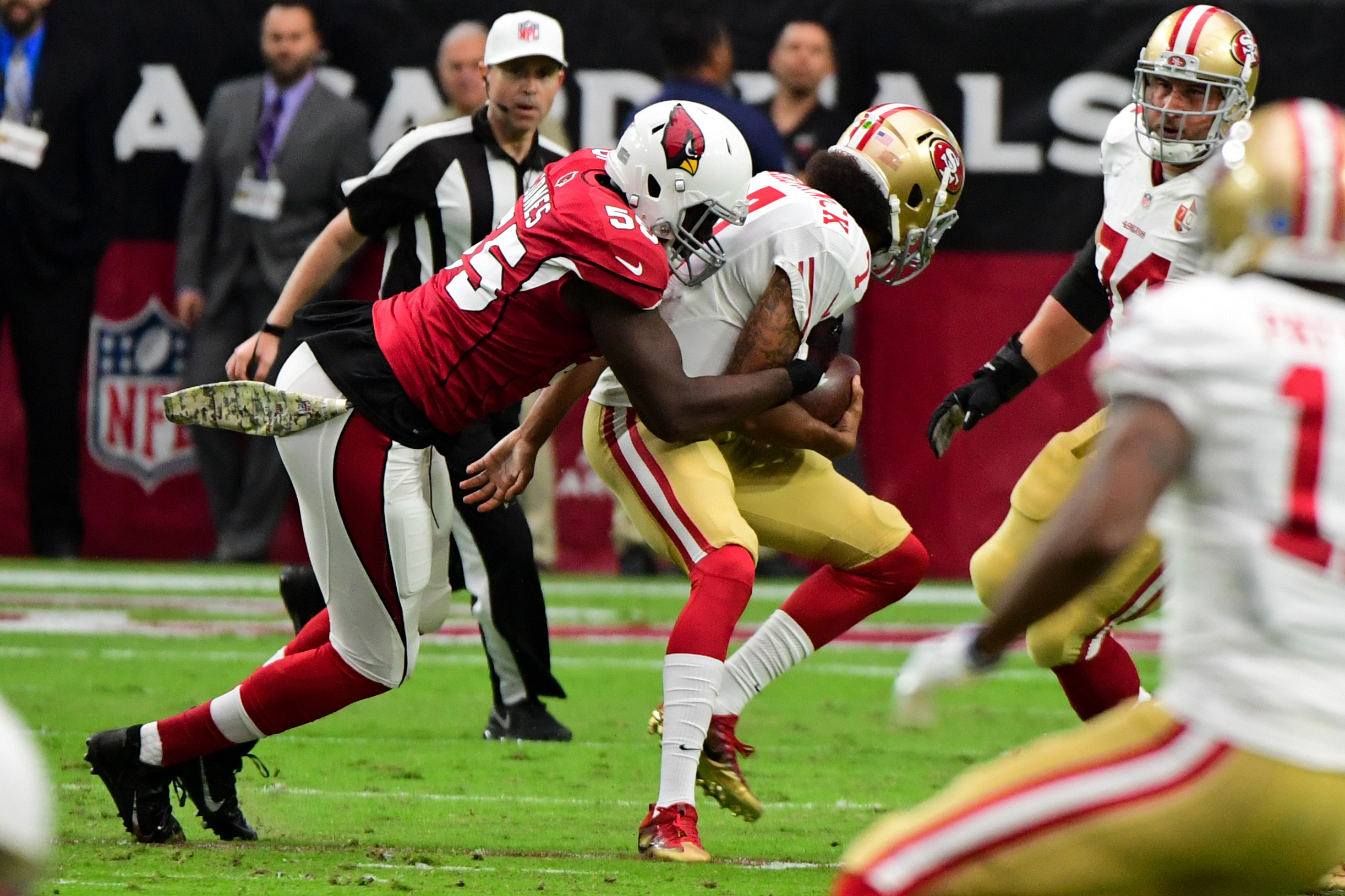 Nov 13, 2016; Glendale, AZ, USA; Arizona Cardinals linebacker Chandler Jones (55) sacks San Francisco 49ers quarterback Colin Kaepernick (7) during the first half at University of Phoenix Stadium. Mandatory Credit: Matt Kartozian-USA TODAY Sports