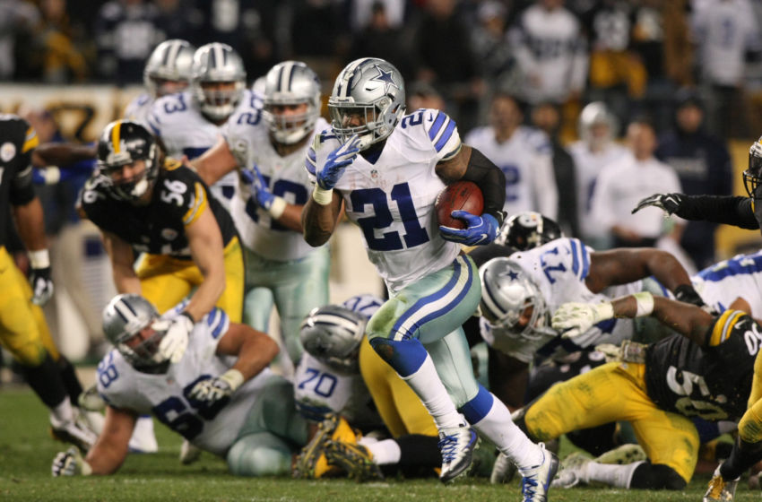 Nov 13, 2016; Pittsburgh, PA, USA; Dallas Cowboys running back Ezekiel Elliott (21) scores the game-winning touchdown against the Pittsburgh Steelers during the second half of their game at Heinz Field. The Cowboys won the game, 35-30. Mandatory Credit: Jason Bridge-USA TODAY Sports