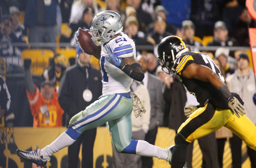 Nov 13, 2016; Pittsburgh, PA, USA; Dallas Cowboys running back Ezekiel Elliott (21) scores on a fourteen yard touchdown run past Pittsburgh Steelers free safety Mike Mitchell (23) during the fourth quarter at Heinz Field. Dallas won 35-30. Mandatory Credit: Charles LeClaire-USA TODAY Sports