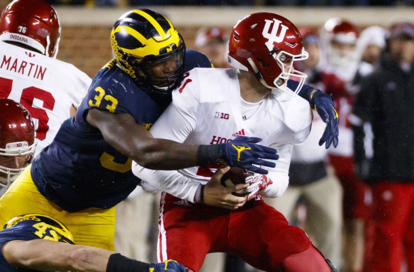Nov 19, 2016; Ann Arbor, MI, USA; Indiana Hoosiers quarterback Richard Lagow (21) is tackled by Michigan Wolverines defensive end Taco Charlton (33) in the second half at Michigan Stadium. Michigan won 20-10. Mandatory Credit: Rick Osentoski-USA TODAY Sports