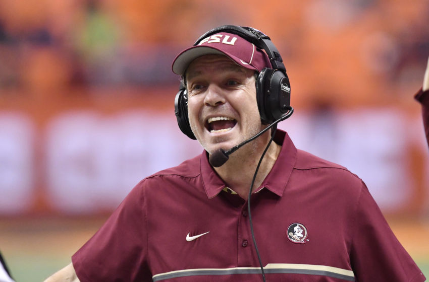 Nov 19, 2016; Syracuse, NY, USA; Florida State Seminoles head coach Jimbo Fisher has a word with an official to dispute a call during the fourth quarter of a game against the Syracuse Orange at the Carrier Dome. Florida State won 45-14. Mandatory Credit: Mark Konezny-USA TODAY Sports