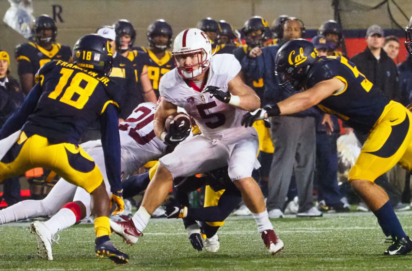Nov 19, 2016; Berkeley, CA, USA; Stanford Cardinal running back Christian McCaffrey (5) carries the ball against the California Golden Bears during the third quarter at Memorial Stadium. The Stanford Cardinal defeated the California Golden Bears 45-31. Mandatory Credit: Kelley L Cox-USA TODAY Sports