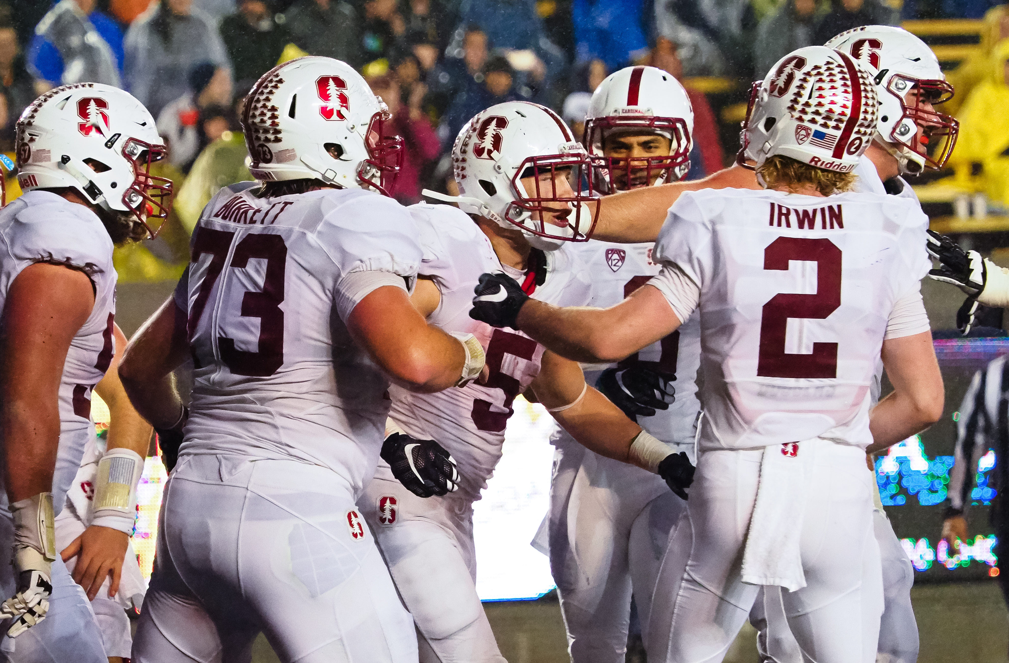 Nov 19, 2016; Berkeley, CA, USA; Stanford Cardinal running back Christian McCaffrey (5) celebrates with teammates after a touchdown against the California Golden Bears during the third quarter at Memorial Stadium. The Stanford Cardinal defeated the California Golden Bears 45-31. Mandatory Credit: Kelley L Cox-USA TODAY Sports