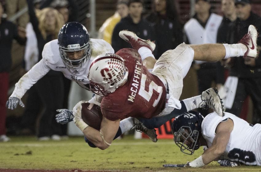November 26, 2016; Stanford, CA, USA; Stanford Cardinal running back Christian McCaffrey (5) scores a touchdown against Rice Owls cornerback J.T. Blasingame (14) during the second quarter at Stanford Stadium. Mandatory Credit: Kyle Terada-USA TODAY Sports