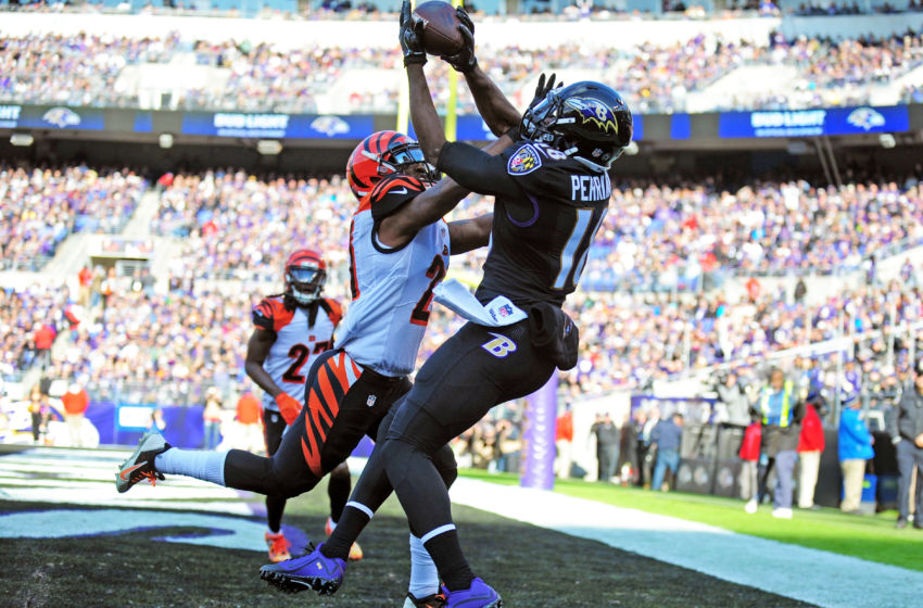 Nov 27, 2016; Baltimore, MD, USA; Baltimore Ravens wide receiver Breshad Perriman (18) catches a touchdown over Cincinnati Bengals cornerback Darqueze Dennard (21) in the first quarter at M&T Bank Stadium. Mandatory Credit: Evan Habeeb-USA TODAY Sports