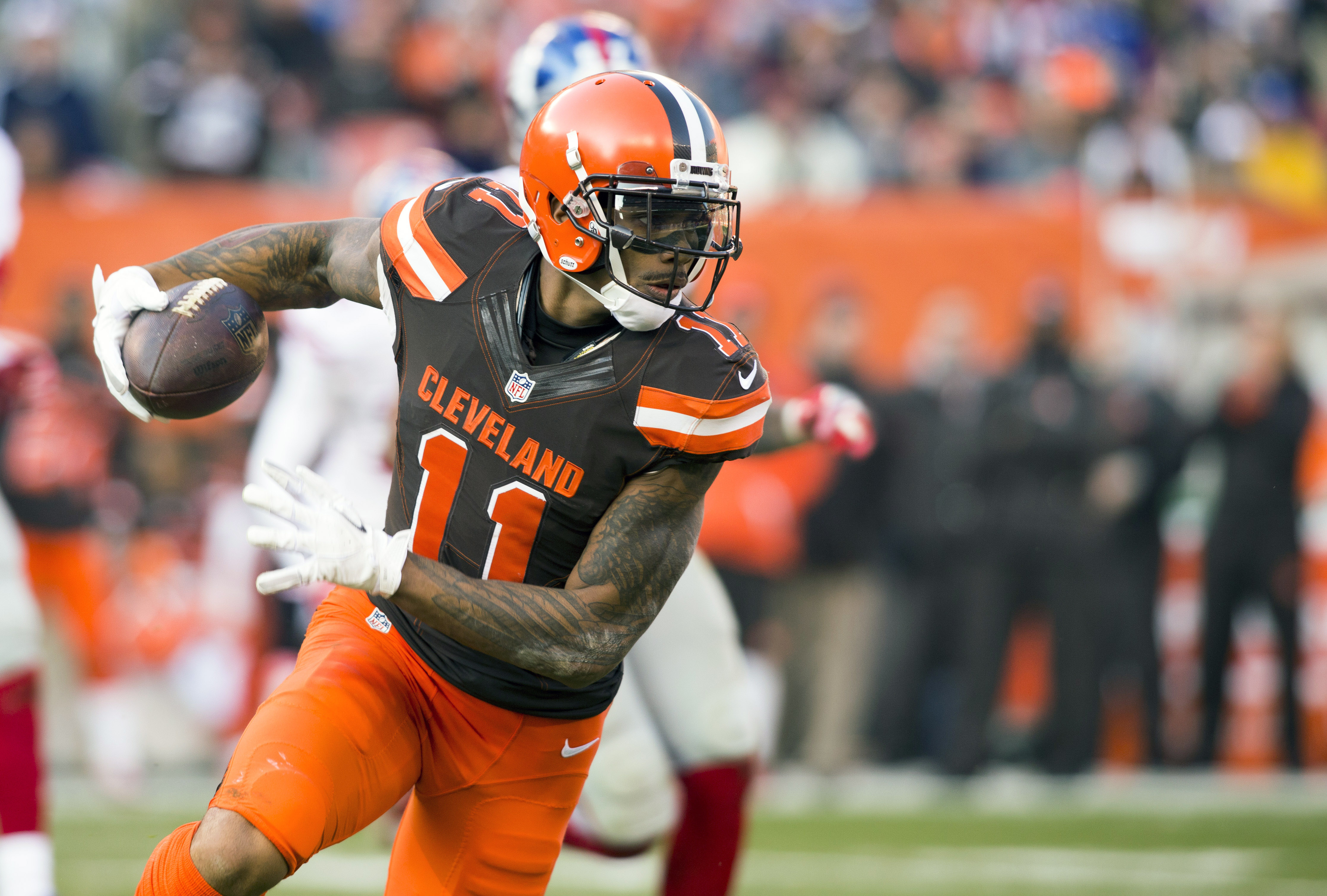 Nov 27, 2016; Cleveland, OH, USA; Cleveland Browns wide receiver Terrelle Pryor (11) runs the ball against the New York Giants during the third quarter at FirstEnergy Stadium. The Giants won 27-13. Mandatory Credit: Scott R. Galvin-USA TODAY Sports