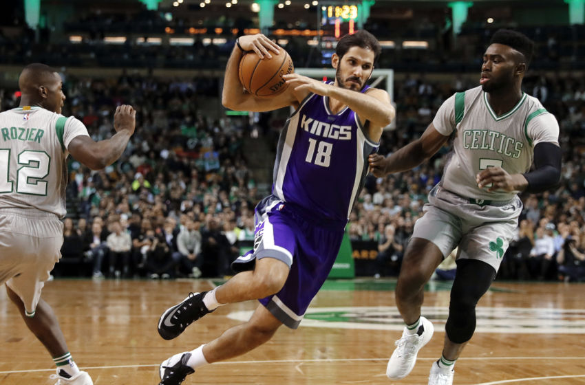 Dec 2, 2016; Boston, MA, USA; Sacramento Kings forward Omri Casspi (18) drives between Boston Celtics guard Terry Rozier (12) and forward Jaylen Brown (7) during the first half at TD Garden. Mandatory Credit: Winslow Townson-USA TODAY Sports