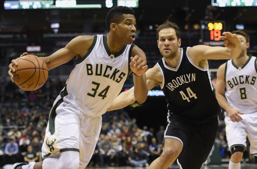 Dec 3, 2016; Milwaukee, WI, USA; Milwaukee Bucks forward Giannis Antetokounmpo (34) drives for the basket against Brooklyn Nets guard Bojan Bogdanovic (44) in the first quarter at BMO Harris Bradley Center. Mandatory Credit: Benny Sieu-USA TODAY Sports