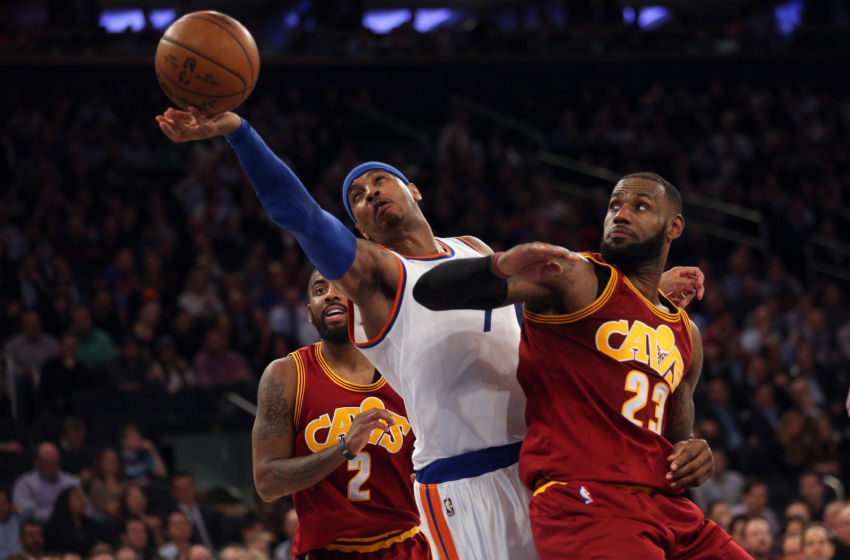 Dec 7, 2016; New York, NY, USA; Cleveland Cavaliers small forward LeBron James (23) and New York Knicks small forward Carmelo Anthony (7) fight for a rebound during the third quarter at Madison Square Garden. Mandatory Credit: Brad Penner-USA TODAY Sports