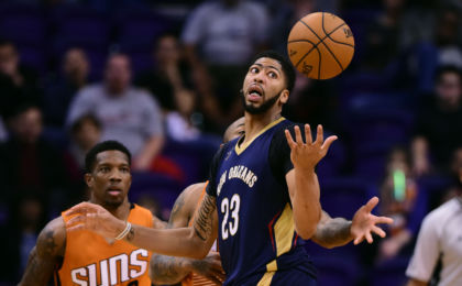 Dec 11, 2016; Phoenix, AZ, USA; New Orleans Pelicans forward Anthony Davis (23) reaches for the loose ball in the second half against the Phoenix Suns at Talking Stick Resort Arena. The New Orleans Pelicans won 120 - 119 in overtime. Mandatory Credit: Jennifer Stewart-USA TODAY Sports