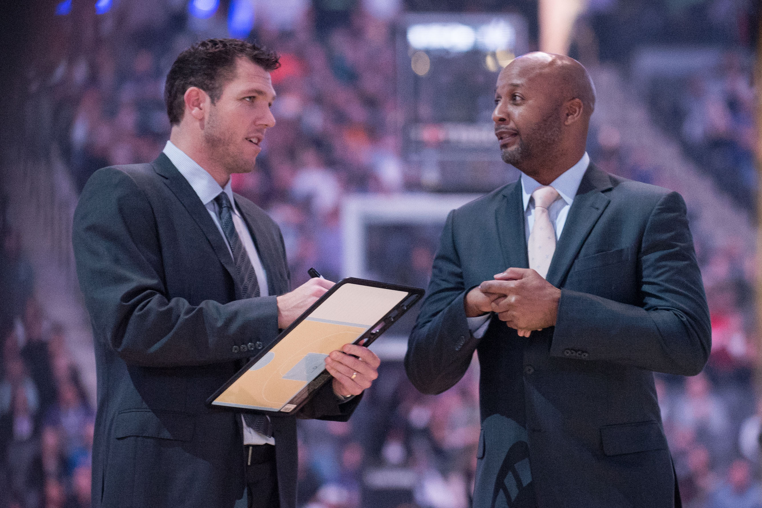 Dec 12, 2016; Sacramento, CA, USA; Los Angeles Lakers head coach Luke Walton and assistant head coach Brian Shaw chat before the game against the Sacramento Kings at Golden 1 Center. Mandatory Credit: Ed Szczepanski-USA TODAY Sports