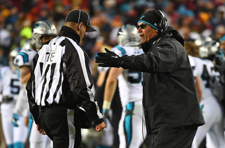 Dec 19, 2016; Landover, MD, USA; Carolina Panthers head coach Ron Rivera (R) discusses a call with back judge Greg Meyer (78) during the second half at FedEx Field. Mandatory Credit: Brad Mills-USA TODAY Sports