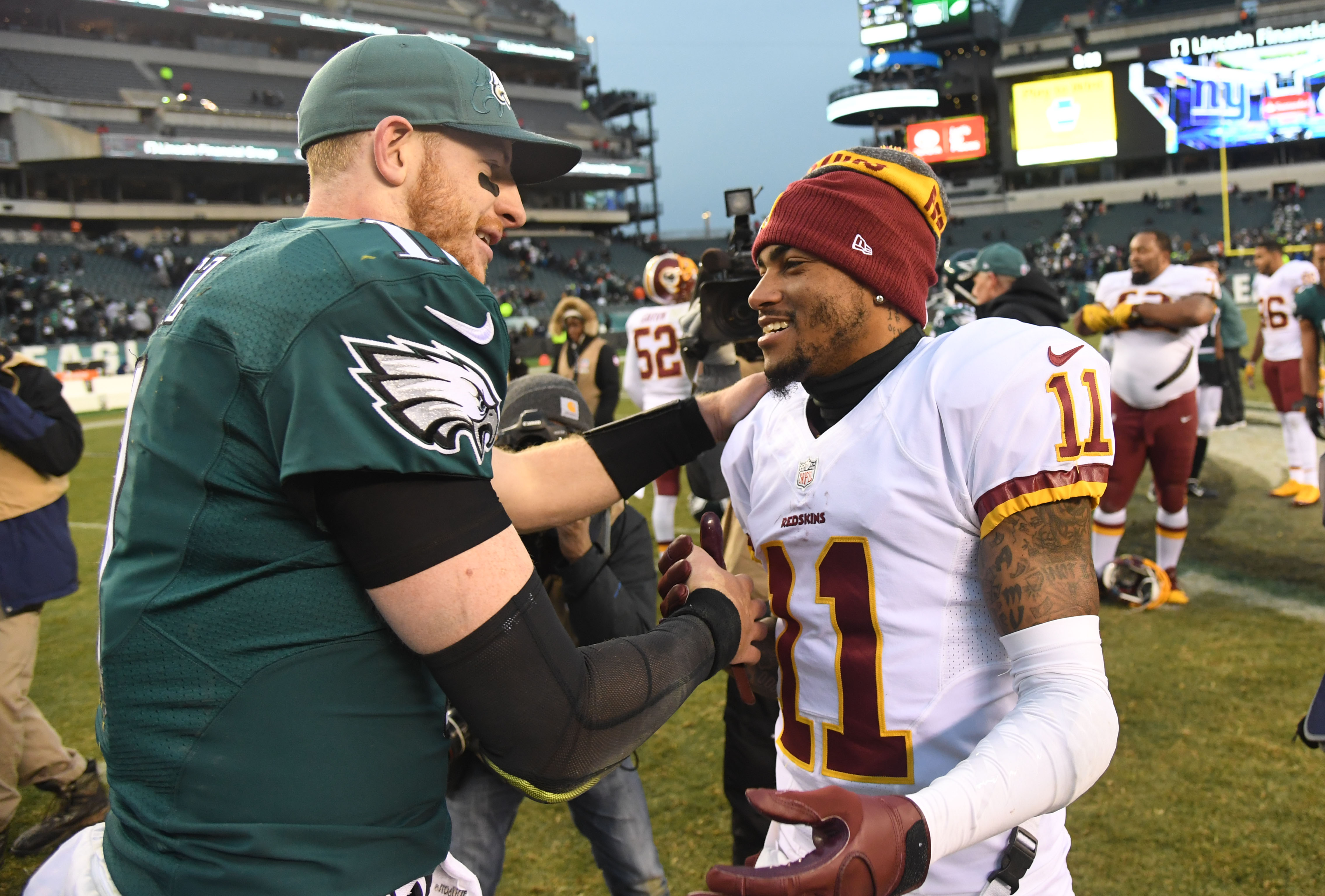 Dec 11, 2016; Philadelphia, PA, USA; Philadelphia Eagles quarterback Carson Wentz (11) speaks with Washington Redskins wide receiver DeSean Jackson (11) after the game at Lincoln Financial Field. Washington defeated Philadelphia 27-22. Mandatory Credit: James Lang-USA TODAY Sports