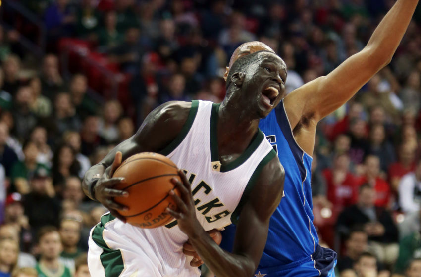 Oct 8, 2016; Madison, WI, USA; Milwaukee Bucks forward Thon Maker (7) gets past a Dallas Mavericks defender at the Kohl Center. Milwaukee defeated Dallas 88-74. Mandatory Credit: Mary Langenfeld-USA TODAY Sports