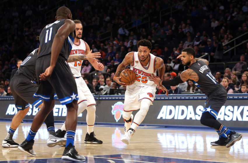 Dec 22, 2016; New York, NY, USA; New York Knicks point guard Derrick Rose (25) drives against Orlando Magic point guard D.J. Augustin (14) during the third quarter at Madison Square Garden. Mandatory Credit: Brad Penner-USA TODAY Sports