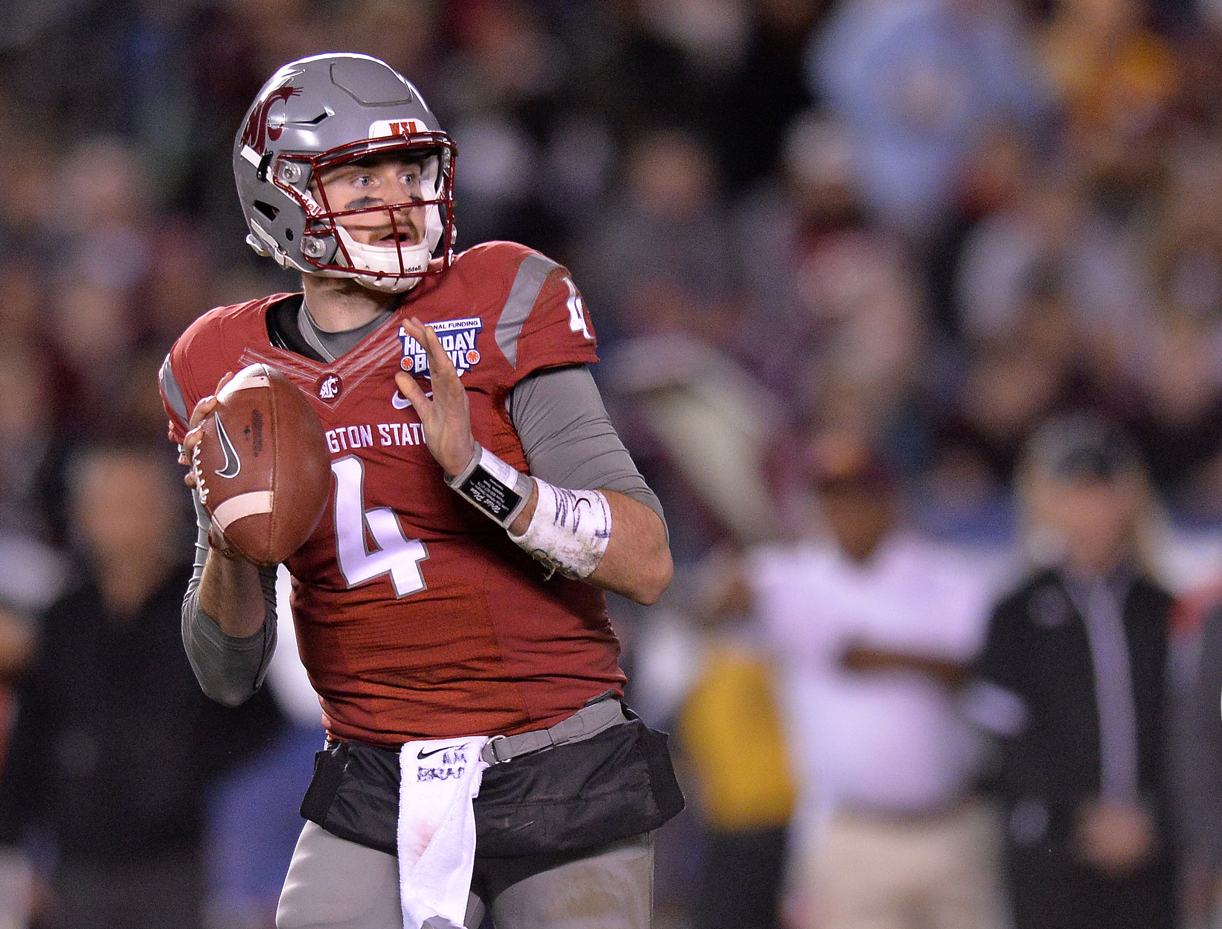 Dec 27, 2016; San Diego , CA, USA; Washington State Cougars quarterback Luke Falk (4) looks to pass against the Minnesota Golden Gophers during the second quarter at Qualcomm Stadium. Mandatory Credit: Jake Roth-USA TODAY Sports