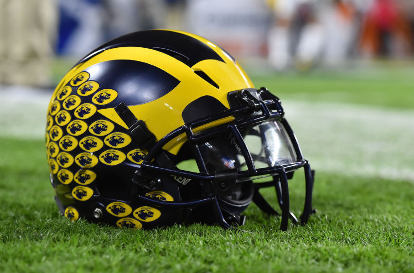 Dec 30, 2016; Miami Gardens, FL, USA; A Michigan Wolverines football helmet sits on the field prior to the game between the Florida State Seminoles and the Michigan Wolverines at Hard Rock Stadium. Mandatory Credit: Jasen Vinlove-USA TODAY Sports