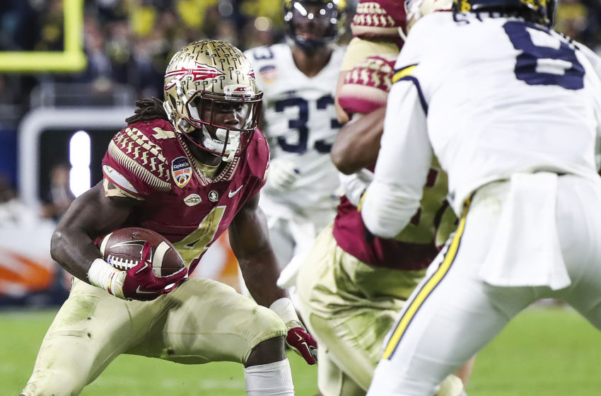 Dec 30, 2016; Miami Gardens, FL, USA; Florida State Seminoles running back Dalvin Cook (4) runs the ball in the second half against the Michigan Wolverines at Hard Rock Stadium. The Seminoles won 33-32. Mandatory Credit: Logan Bowles-USA TODAY Sports