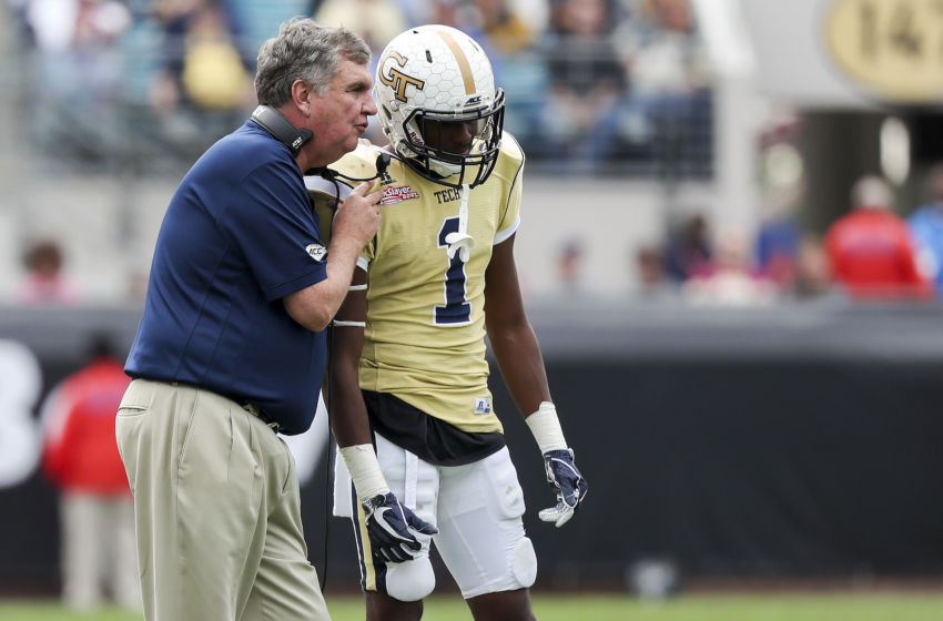 Dec 31, 2016; Jacksonville, FL, USA; Georgia Tech Yellow Jackets head coach Paul Johnson (left) gives instructions to Georgia Tech Yellow Jackets running back Qua Searcy (1) in the second half against the Kentucky Wildcats at EverBank Field. The Georgia Tech Yellow Jackets won 33-18. Mandatory Credit: Logan Bowles-USA TODAY Sports