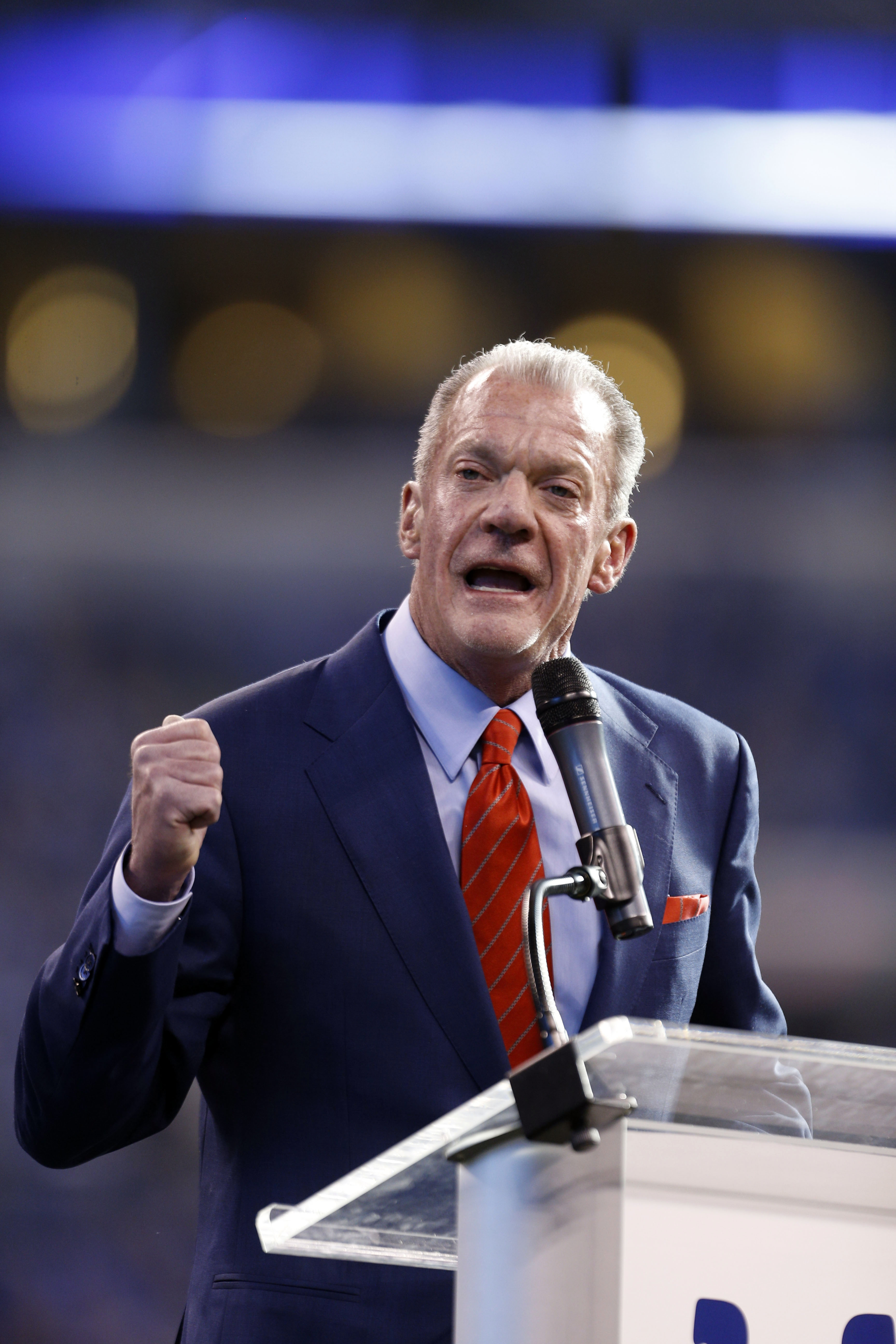 Jan 1, 2017; Indianapolis, IN, USA; Indianapolis Colts owner Jim Irsay inducts former president Bill Polian into the Colts Ring of Honor during halftime of the game against the Jacksonville Jaguars at Lucas Oil Stadium. Mandatory Credit: Brian Spurlock-USA TODAY Sports