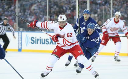NHL Trade Deadline: Detroit Red Wings left wing Thomas Vanek (62) shoots as Toronto Maple Leafs right wing Nikita Soshnikov (26) gives chase during the Centennial Classic ice hockey game at BMO Field. Mandatory Credit: Tom Szczerbowski-USA TODAY Sports