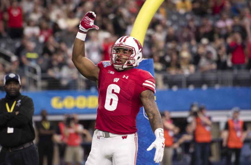 Jan 2, 2017; Arlington, TX, USA; Wisconsin Badgers running back Corey Clement (6) celebrates after scoring a touchdown against the Western Michigan Broncos during the first quarter at AT&T Stadium. Mandatory Credit: Jerome Miron-USA TODAY Sports