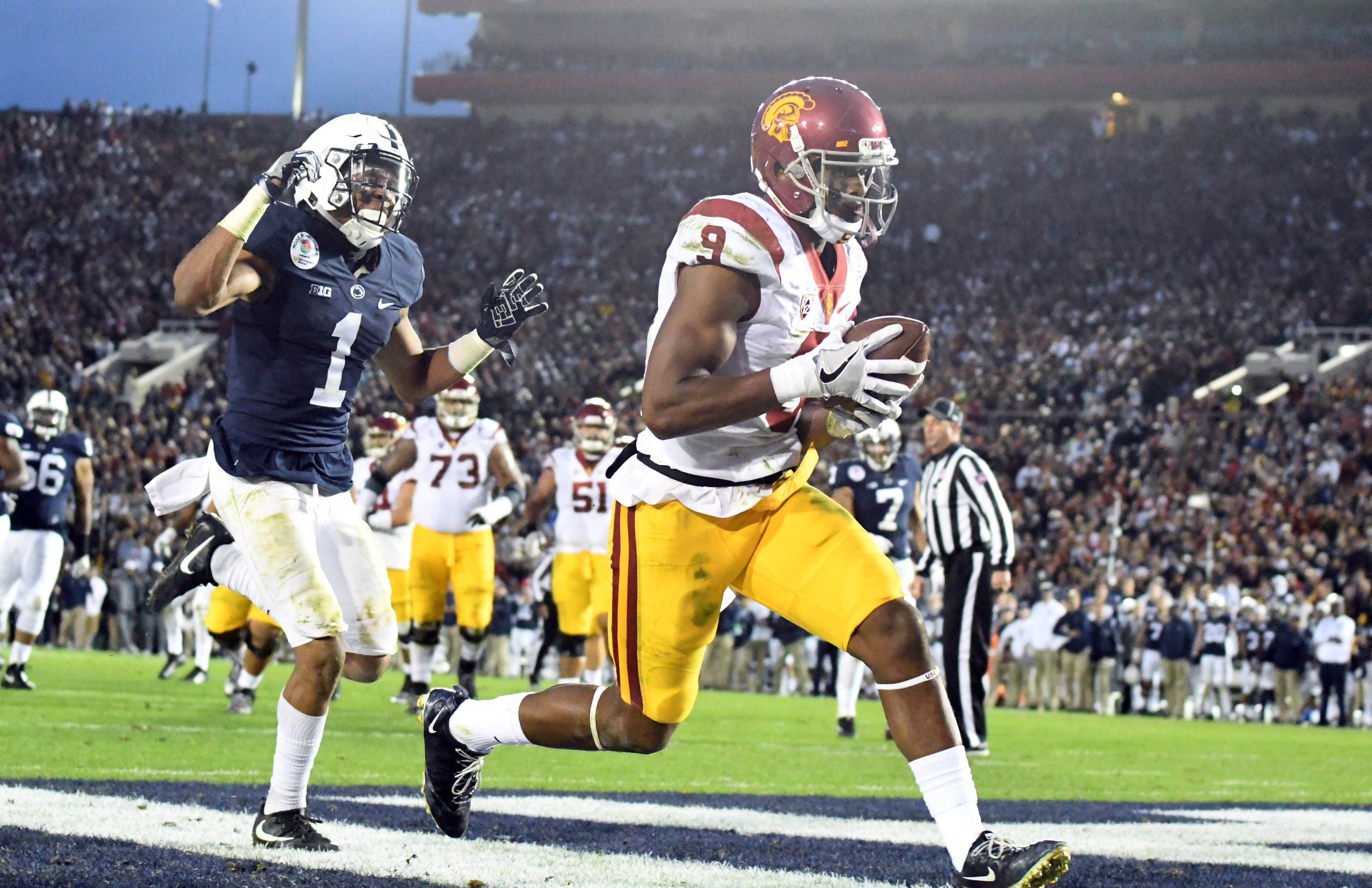 Jan 2, 2017; Pasadena, CA, USA; USC Trojans wide receiver JuJu Smith-Schuster (9) makes a catch for a touchdown against Penn State Nittany Lions cornerback Christian Campbell (1) during the third quarter of the 2017 Rose Bowl game at Rose Bowl. Mandatory Credit: Jayne Kamin-Oncea-USA TODAY Sports