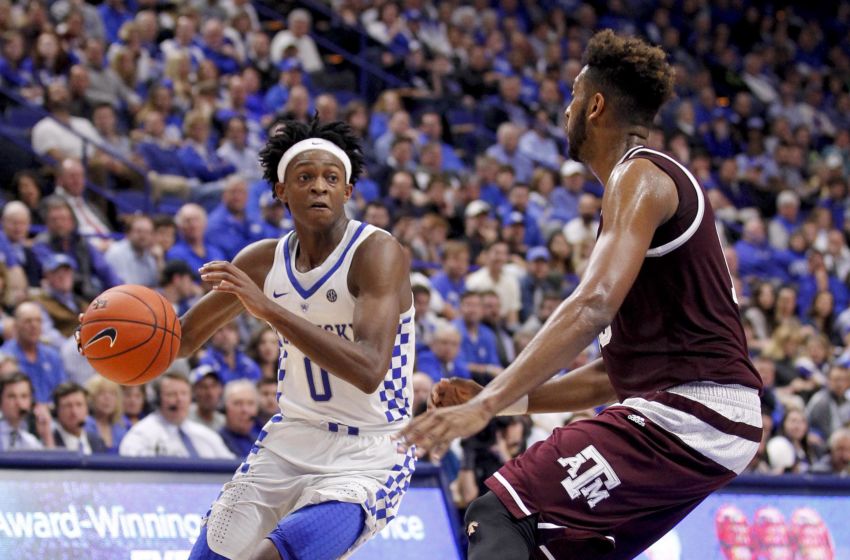 Jan 3, 2017; Lexington, KY, USA; Kentucky Wildcats guard De'Aaron Fox (0) dribbles the ball against Texas A&M Aggies forward Tonny Trocha-Morelos (10) in the second half at Rupp Arena. Kentucky defeated Texas A&M 100-58. Mandatory Credit: Mark Zerof-USA TODAY Sports