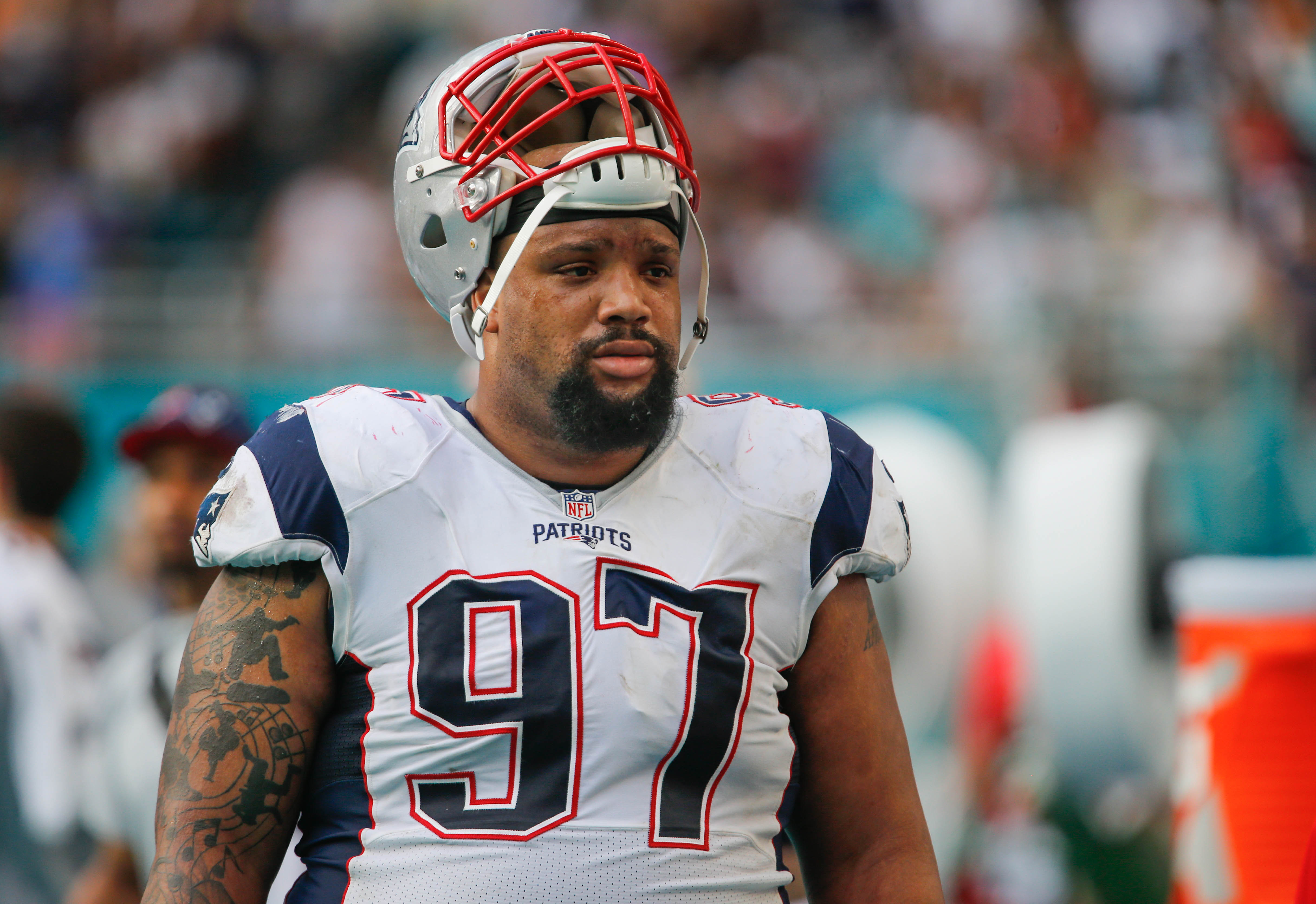 Jan 1, 2017; Miami Gardens, FL, USA; New England Patriots defensive tackle Alan Branch (97) walks on the sidelines during the second half of an NFL football game against the Miami Dolphins at Hard Rock Stadium. The Patriots won 35-14. Mandatory Credit: Reinhold Matay-USA TODAY Sports