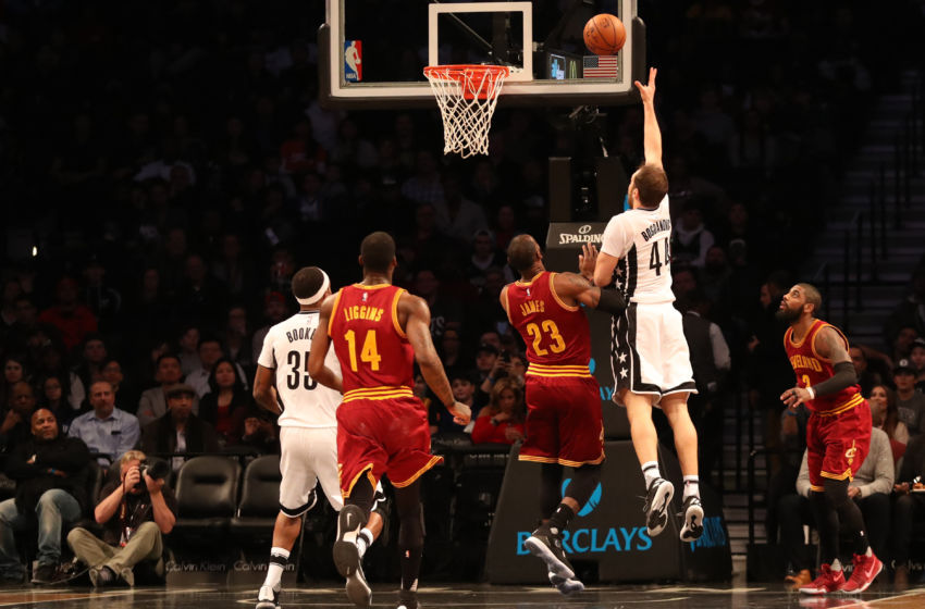 Jan 6, 2017; Brooklyn, NY, USA; Brooklyn Nets guard Bojan Bogdanovic (44) shoots the ball over Cleveland Cavaliers forward LeBron James (23) during the first quarter at Barclays Center. Mandatory Credit: Anthony Gruppuso-USA TODAY Sports