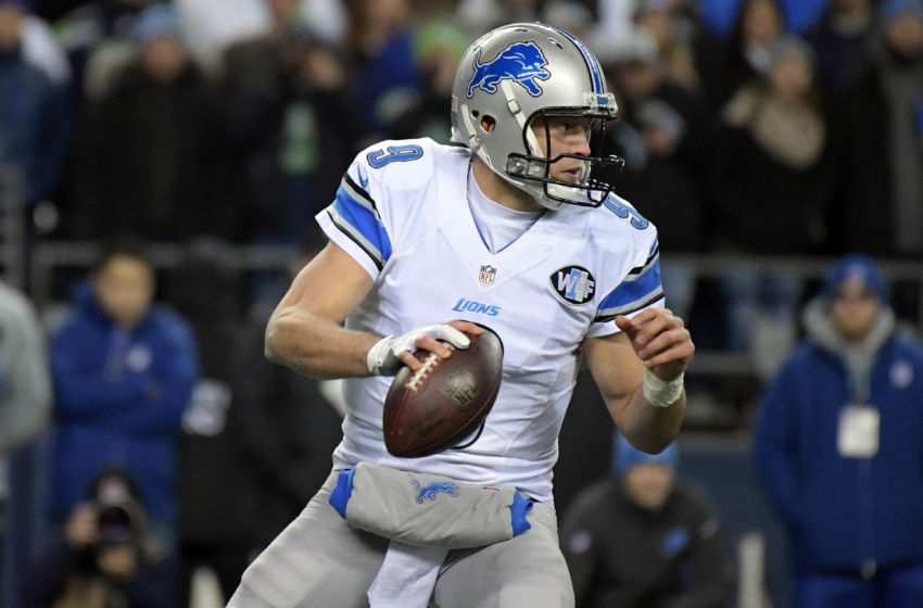 January 7, 2017; Seattle, WA, USA; Detroit Lions quarterback Matthew Stafford (9) rolls out to pass against the Seattle Seahawks during the first half in the NFC Wild Card playoff football game at CenturyLink Field. Mandatory Credit: Kirby Lee-USA TODAY Sports