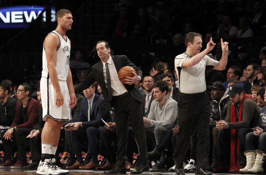 Jan 8, 2017; Brooklyn, NY, USA; Brooklyn Nets head coach Kenny Atkinson reacts with center Brook Lopez (11) during the second quarter against Philadelphia 76ers at Barclays Center. Mandatory Credit: Nicole Sweet-USA TODAY Sports
