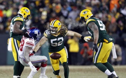 Jan 8, 2017; Green Bay, WI, USA; Green Bay Packers outside linebacker Clay Matthews (52) chases a fumble with New York Giants running back Paul Perkins (28) during the second half in the NFC Wild Card playoff football game at Lambeau Field. Mandatory Credit: Jeff Hanisch-USA TODAY Sports