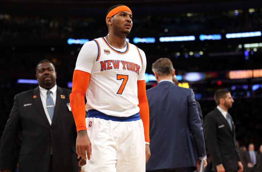 Jan 9, 2017; New York, NY, USA; New York Knicks small forward Carmelo Anthony (7) is escorted off the court after being ejected during the third quarter against the New Orleans Pelicans at Madison Square Garden. Mandatory Credit: Brad Penner-USA TODAY Sports