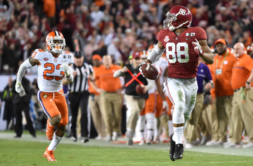Jan 9, 2017; Tampa, FL, USA; Alabama Crimson Tide tight end O.J. Howard (88) runs a touchdown ahead of Clemson Tigers safety Van Smith (23) during the third quarter in the 2017 College Football Playoff National Championship Game at Raymond James Stadium. Mandatory Credit: Steve Mitchell-USA TODAY Sports