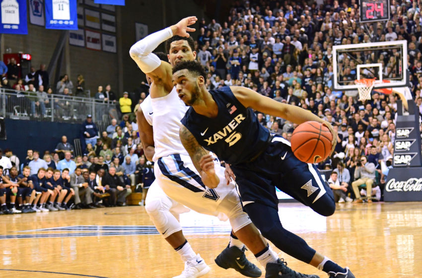 Jan 10, 2017; Villanova, PA, USA; Xavier Musketeers guard Trevon Bluiett (5) dribbles the ball past Villanova Wildcats guard Josh Hart (3) during the first half at The Pavilion. Mandatory Credit: Eric Hartline-USA TODAY Sports