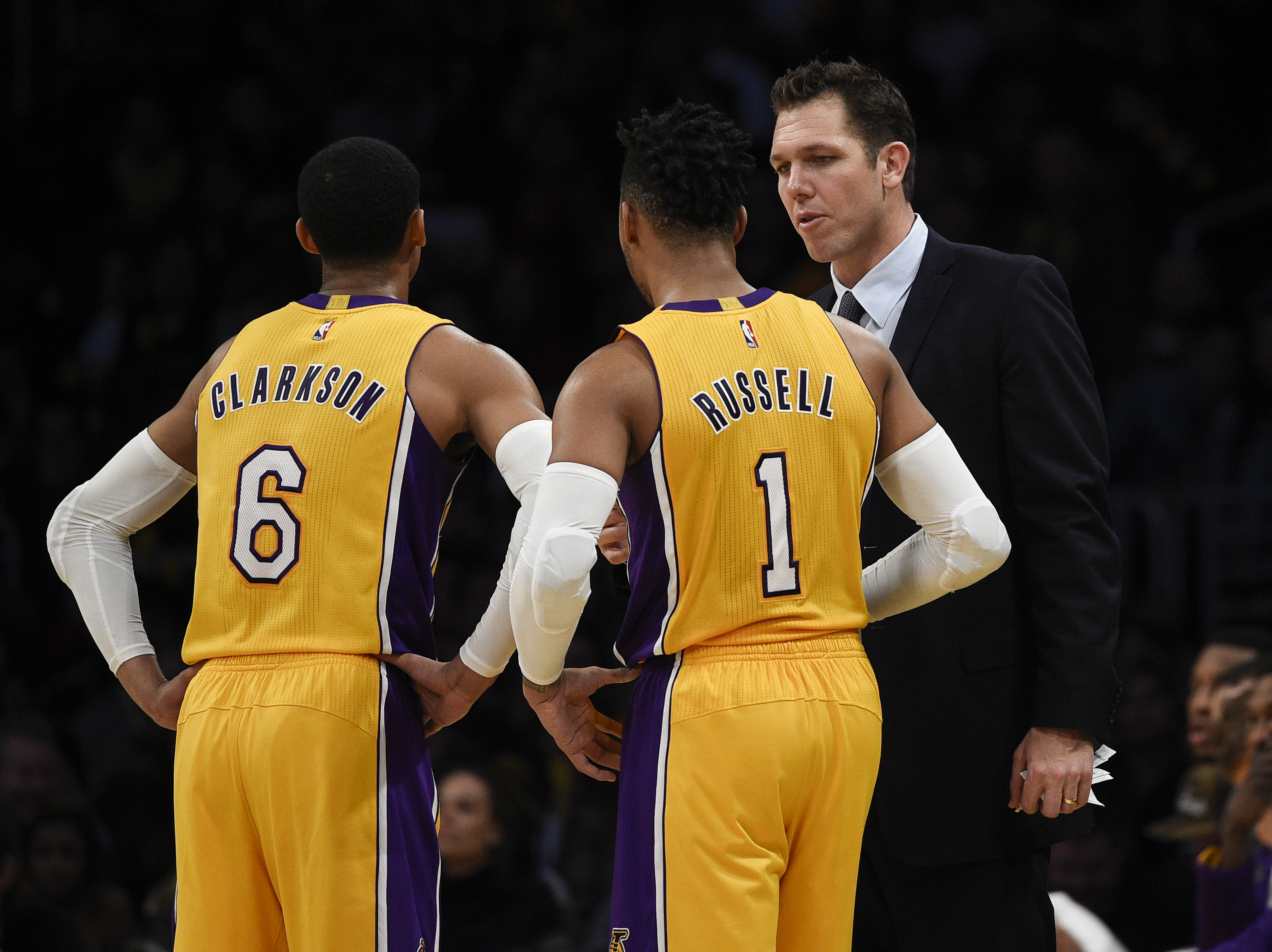 Jan 10, 2017; Los Angeles, CA, USA; Los Angeles Lakers head coach Luke Walton (right) talks with guard D'Angelo Russell (1) and guard Jordan Clarkson (6) during the fourth quarter against the Portland Trail Blazers at Staples Center. The Portland Trail Blazers won 108-87. Mandatory Credit: Kelvin Kuo-USA TODAY Sports