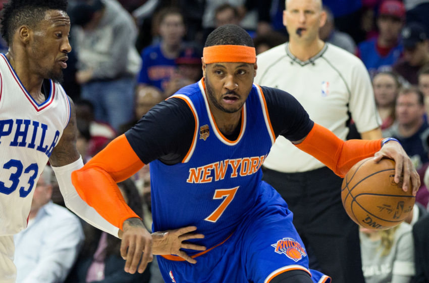 Jan 11, 2017; Philadelphia, PA, USA; New York Knicks forward Carmelo Anthony (7) dribbles past Philadelphia 76ers forward Robert Covington (33) during the first quarter at Wells Fargo Center. Mandatory Credit: Bill Streicher-USA TODAY Sports