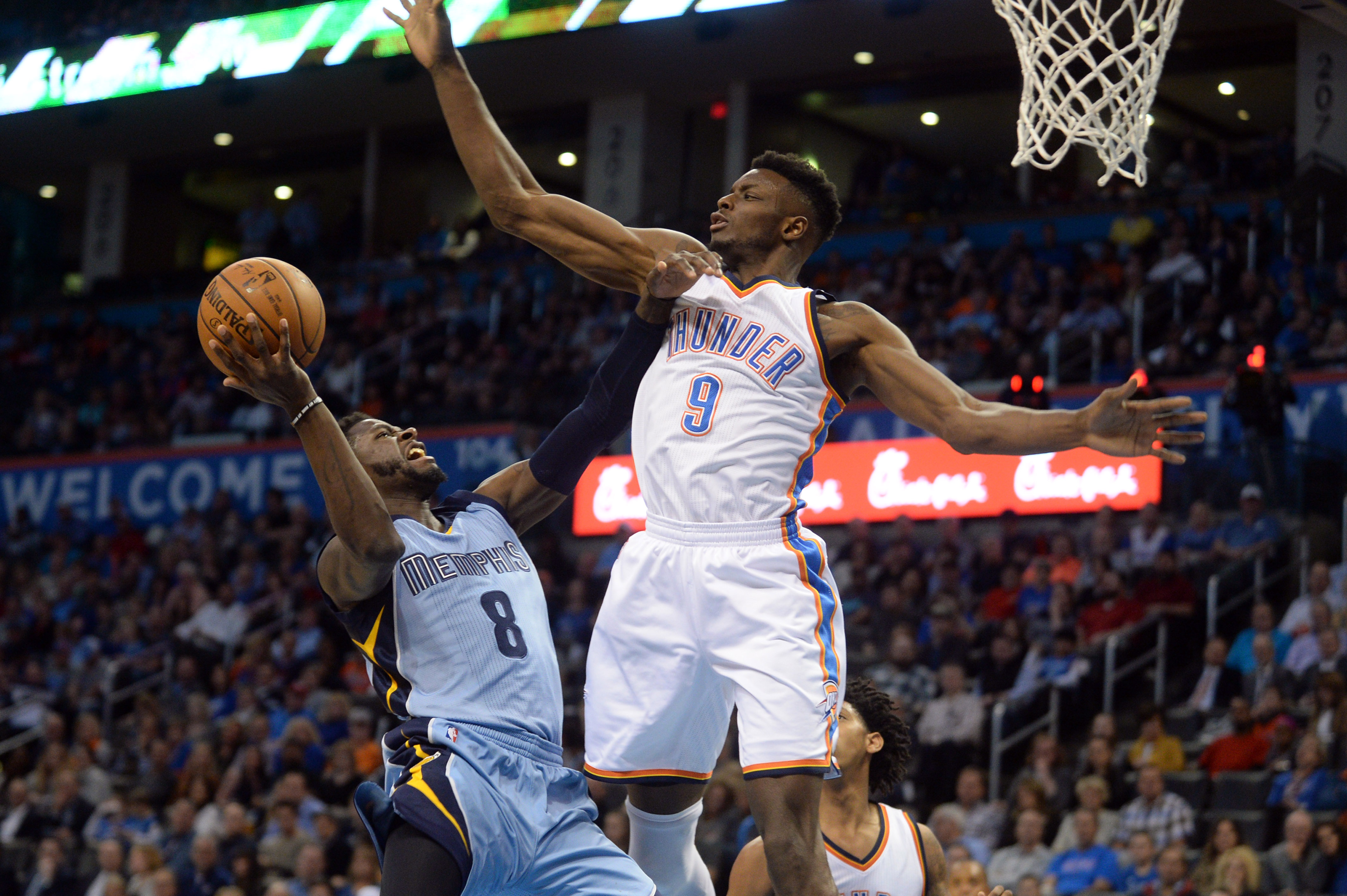 Jan 11, 2017; Oklahoma City, OK, USA; Oklahoma City Thunder forward Jerami Grant (9) blocks a shot attempt by Memphis Grizzlies forward James Ennis (8) during the second quarter at Chesapeake Energy Arena. Mandatory Credit: Mark D. Smith-USA TODAY Sports