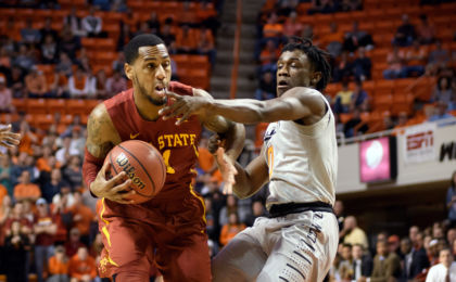 Jan 11, 2017; Stillwater, OK, USA; Iowa State Cyclones guard Monte Morris (11) drives to the basket defended by Oklahoma State Cowboys guard Brandon Averette (0) during the first half at Gallagher-Iba Arena. Mandatory Credit: Rob Ferguson-USA TODAY Sports