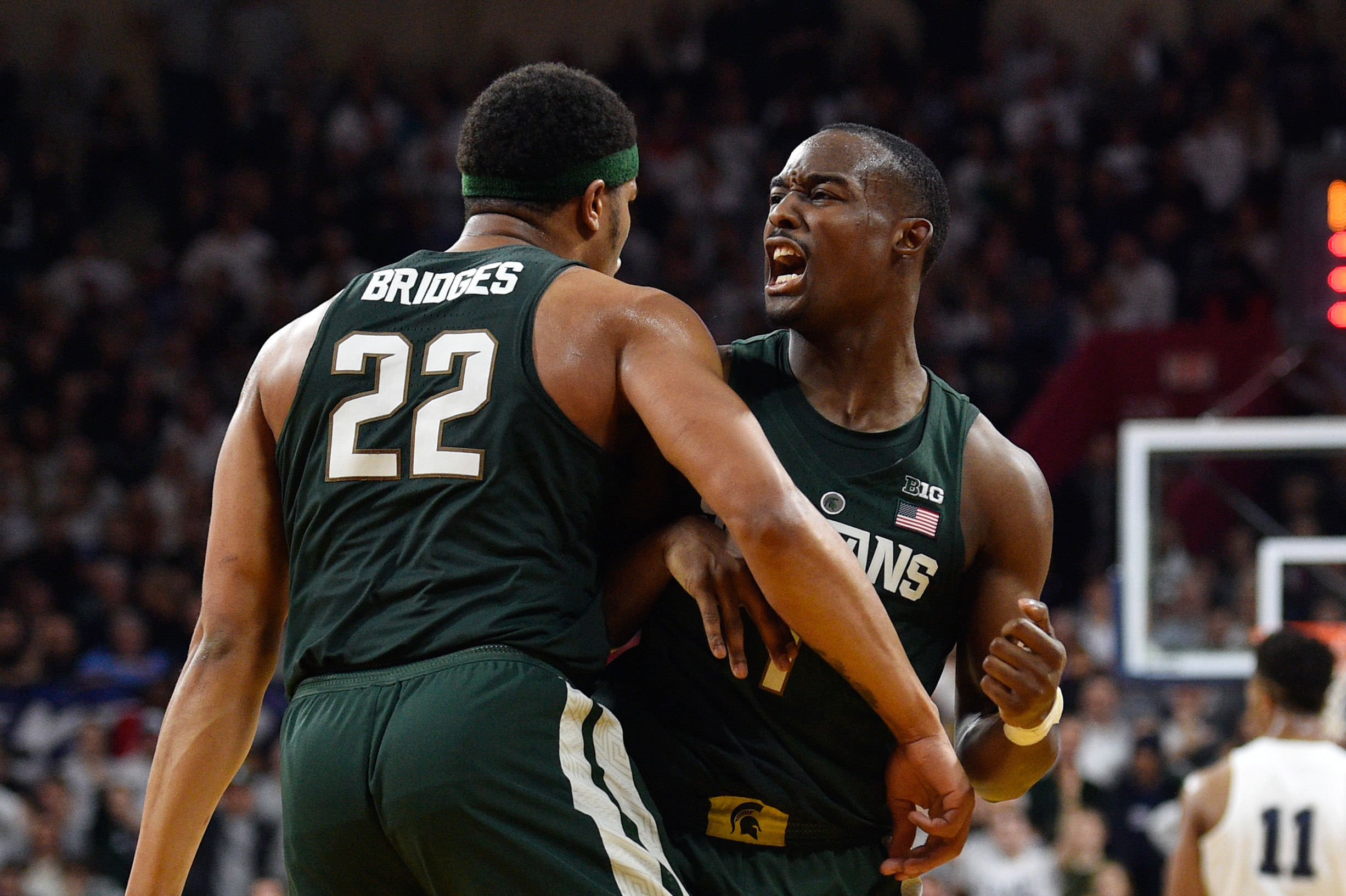 Jan 7, 2017; Philadelphia, PA, USA; Michigan State Spartans guard Miles Bridges (22) celebrates a blocked shot with guard Joshua Langford (1) during the second half against the Penn State Nittany Lions at Palestra. Penn State won 72-63. Mandatory Credit: Derik Hamilton-USA TODAY Sports