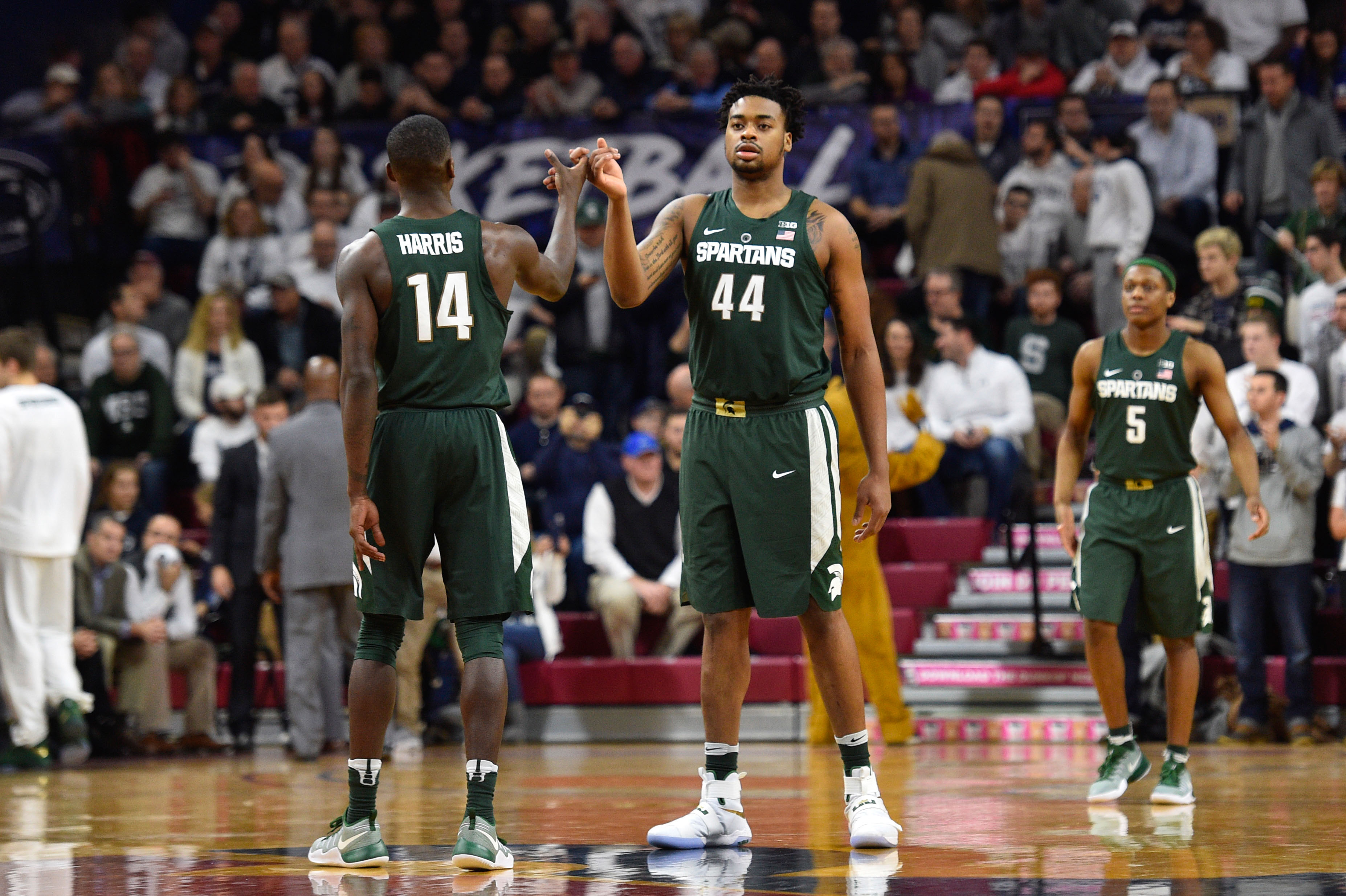 Jan 7, 2017; Philadelphia, PA, USA; Michigan State Spartans forward Nick Ward (44) high-fives guard Eron Harris (14) during the first half against the Penn State Nittany Lions at Palestra. Mandatory Credit: Derik Hamilton-USA TODAY Sports