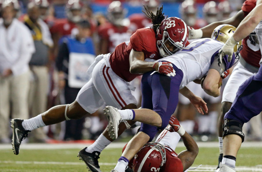 Dec 31, 2016; Atlanta, GA, USA; Washington Huskies quarterback Jake Browning (3) is tackled by Alabama Crimson Tide linebacker Tim Williams (56) and defensive back Tony Brown (2, bottom) during the third quarter in the 2016 CFP Semifinal at the Georgia Dome. Alabama defeated Washington 24-7. Mandatory Credit: Jason Getz-USA TODAY Sports