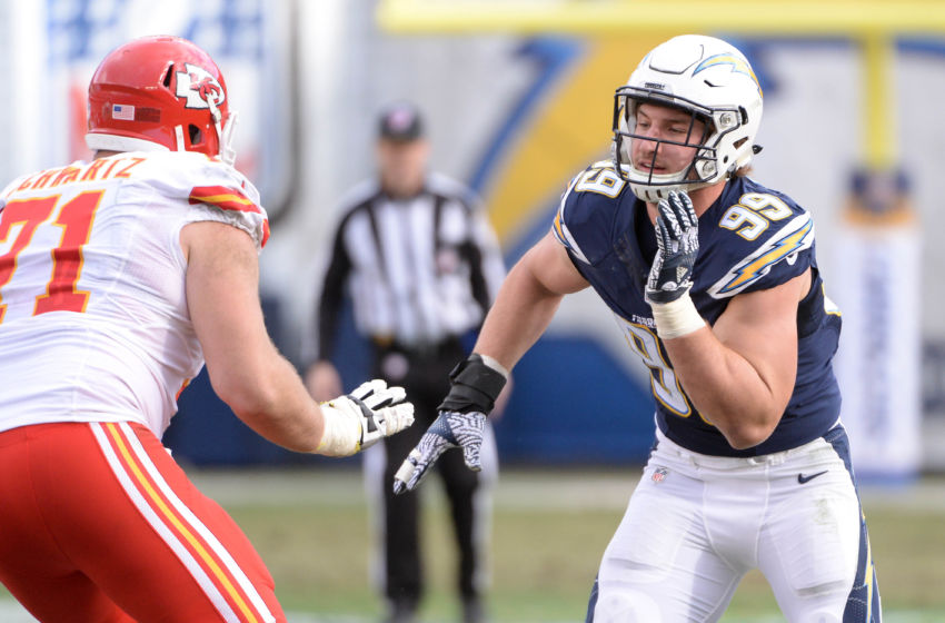 Jan 1, 2017; San Diego, CA, USA; Kansas City Chiefs offensive tackle Mitchell Schwartz (71) reacts to the rush of San Diego Chargers defensive end Joey Bosa (99) during the first half of the game at Qualcomm Stadium. The Chiefs won 37-27. Mandatory Credit: Orlando Ramirez-USA TODAY Sports