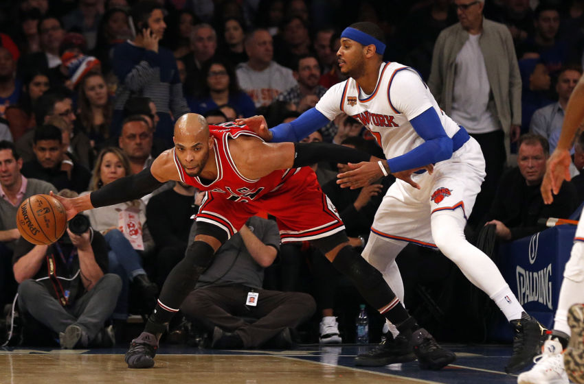 Jan 12, 2017; New York, NY, USA; Chicago Bulls forward Taj Gibson (22) controls the ball while being defended by New York Knicks forward Carmelo Anthony (7) during the first quarter at Madison Square Garden. Mandatory Credit: Adam Hunger-USA TODAY Sports