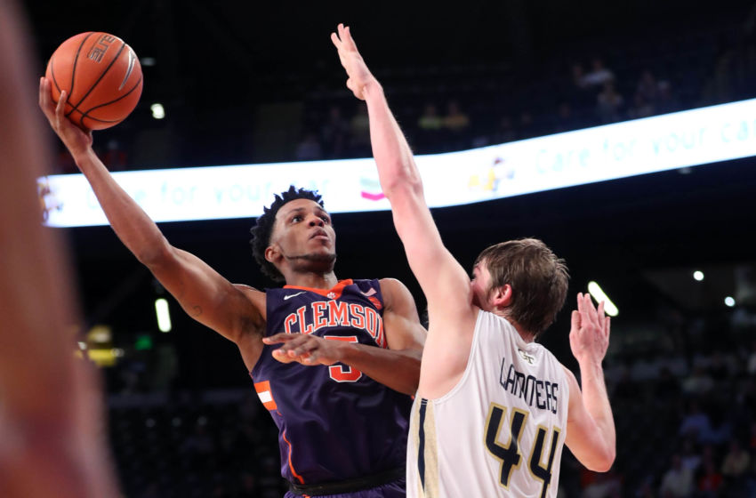 Jan 12, 2017; Atlanta, GA, USA; Clemson Tigers forward Jaron Blossomgame (5) attempts a shot against Georgia Tech Yellow Jackets center Ben Lammers (44) in the second half of their game at McCamish Pavilion. Georgia Tech won 75-63. Mandatory Credit: Jason Getz-USA TODAY Sports