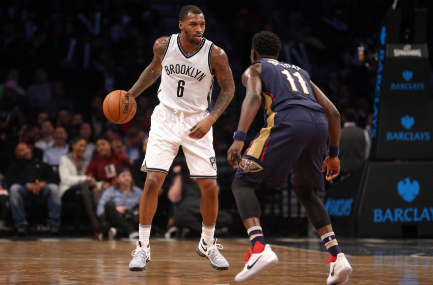 Jan 12, 2017; Brooklyn, NY, USA; Brooklyn Nets shooting guard Sean Kilpatrick (6) controls the ball against New Orleans Pelicans point guard Jrue Holiday (11) during the fourth quarter at Barclays Center. Mandatory Credit: Brad Penner-USA TODAY Sports